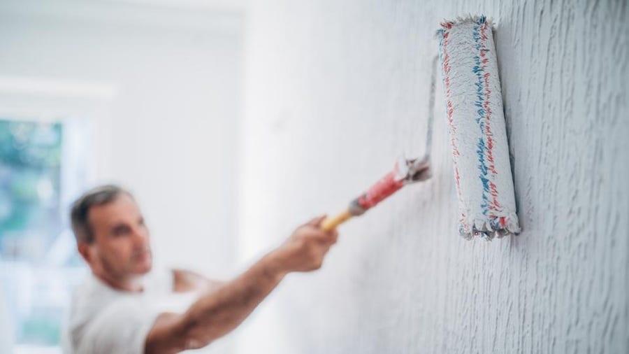 How to paint over wallpaper
